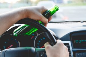 Holding Bear Bottle While Driving